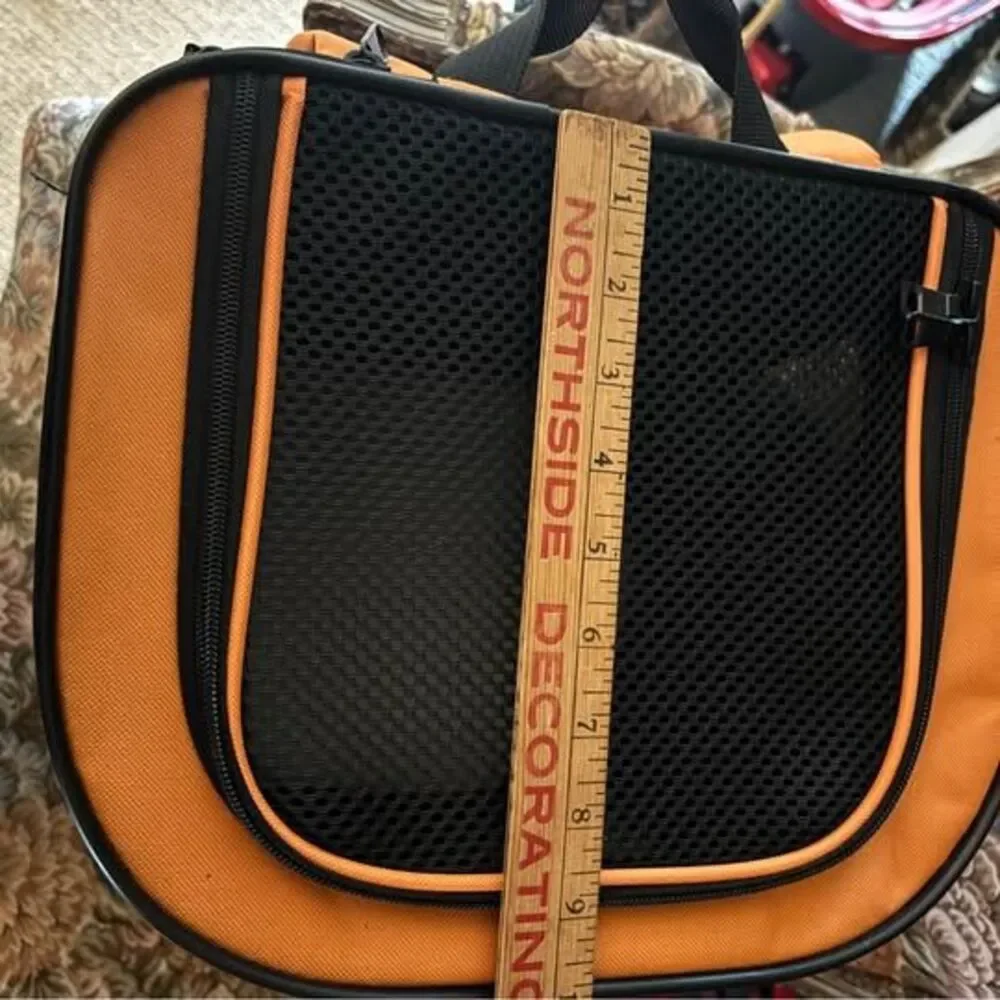 Orange and black soft-sided pet carrier, about 18x12x9 inches
